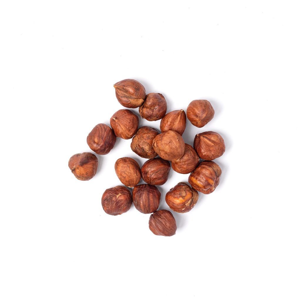 Hazelnuts on a white background, top view