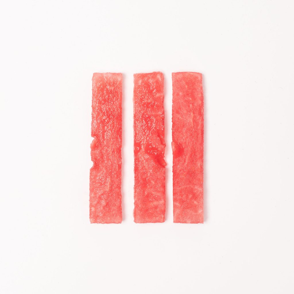 BLW-style watermelon sticks on a white background